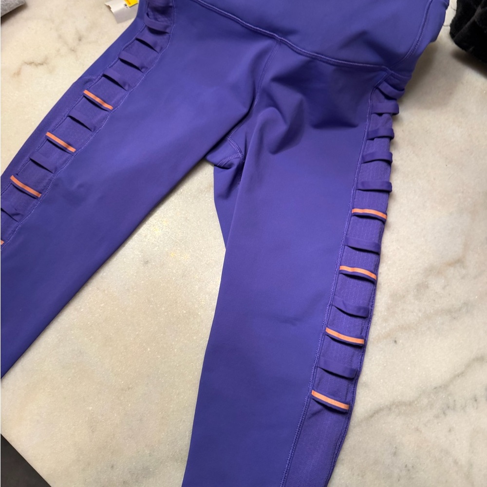 Purple lululemon wunder tights crop Leggings with Pink Accents size 6